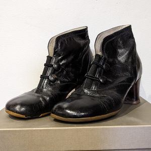 Worn black Fluevog Operetta boots
